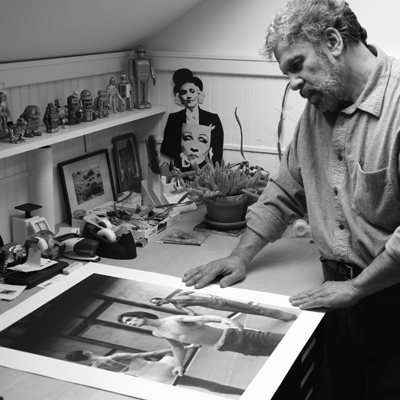 Printer Sal Lopes, holding one of the large-format platinum prints